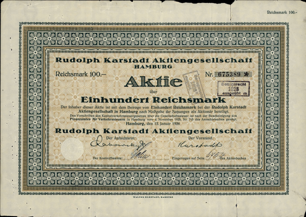 Ein alter deutscher Geldschein mit einem schwarzen Hintergrund und der Aufschrift "Rudolph Karlstadt Aktiengesellschaft Hamburg" darauf.