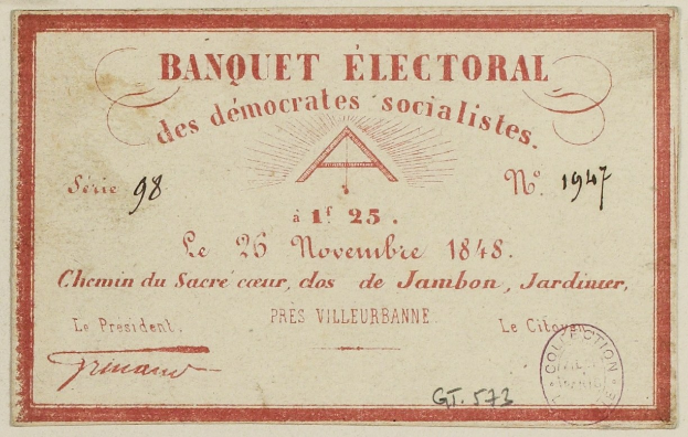 Alter Umschlag mit rotem Rand, mit einer Briefmarke und der Aufschrift "Banquet Electoral des Democrats Socialists".