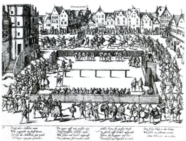 Eine Schwarz-Weiß-Zeichnung einer kämpfenden Menge in einer Stadt, mit Gebäuden im Hintergrund und dem Text "Die Schlacht von Düsseldorf" unten.