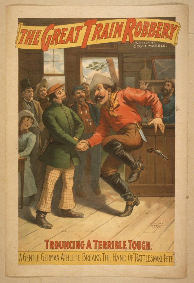 Plakat zeigt eine Gruppe von Menschen auf einem Boden mit einem, der eine Waffe hält, ein Fenster und eine Wand im Hintergrund und den Text "The Great Train Robbery - Trouching a Terrible Tough" oben und unten.