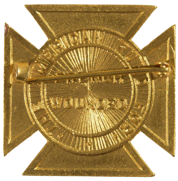 Gold American Fire Department badge with a star insignia and text, centered in the image.